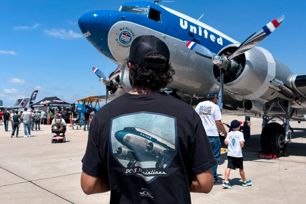 dc3-exterior-background-back-of-dc3-shirt-foreground